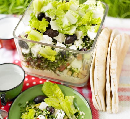 Layered houmous, tabbouleh and feta picnic bowl