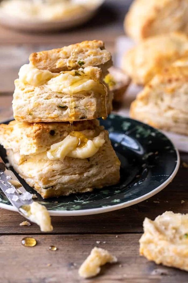 Layered jalapeño cheddar biscuits with salted honey butter