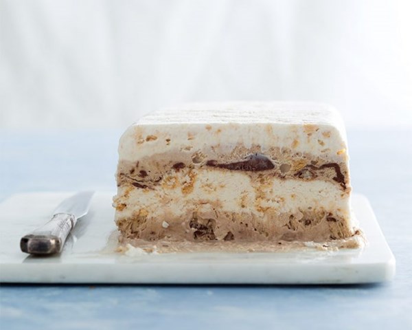 Layered meringue terrine [white chocolate cream, coffee cream, meringue cookies, toffee chocolate fudge]