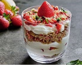 Layered summer strawberry cheesecakes