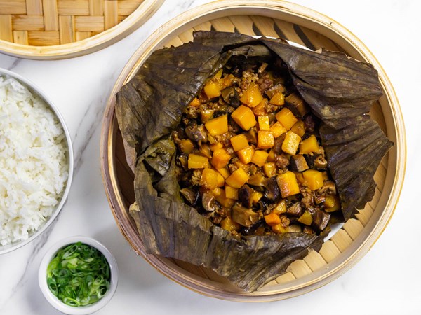 Leaf-wrapped winter squash with pork and shiitakes