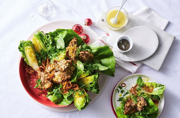 Leafy greens, crisp onion and Parmesan croutons