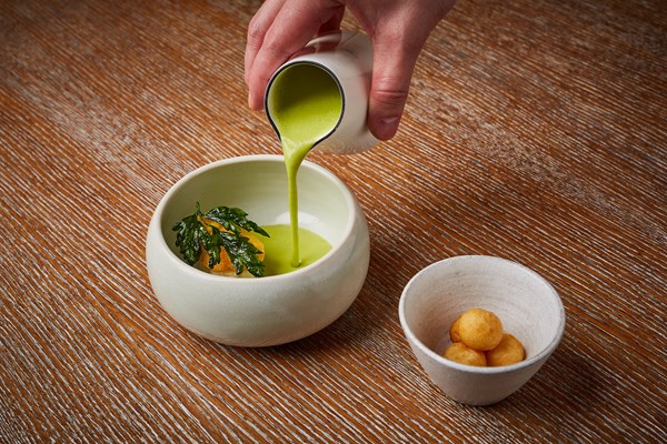 Leek and potato soup with smoked haddock and potato doughnuts