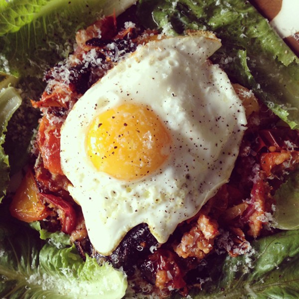 Leftover panzanella cake with a fried egg