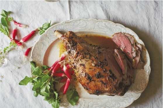 Leg of lamb stuffed with lemon and many herbs