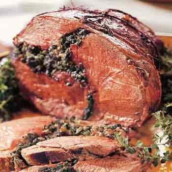 Leg of lamb stuffed with wild mushrooms and greens