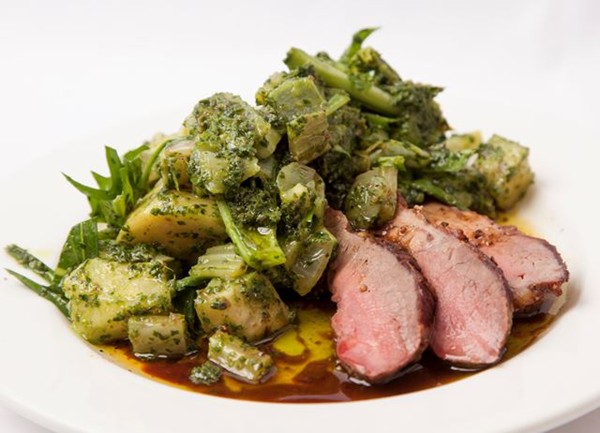 Leg of lamb with braised celeriac, fennel and bitter leaves