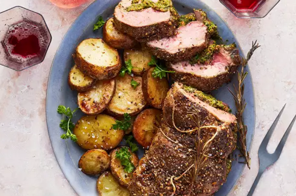 Leg of lamb with pistachio stuffing and potatoes