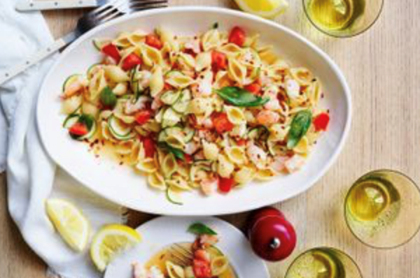 Lemon and chilli prawn pasta with zucchini, basil and tomato