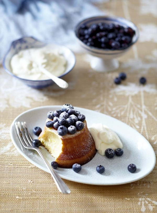 Lemon and coconut puddings with fresh blueberries