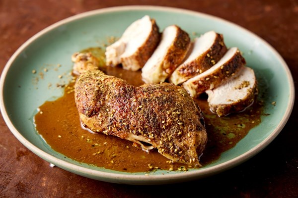 Lemon and za'atar chicken under a brick