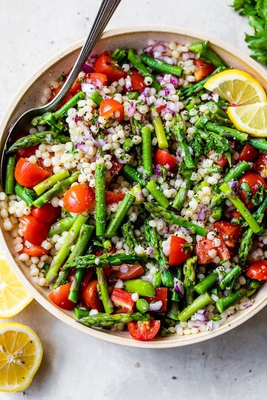 Lemon asparagus couscous salad with tomatoes