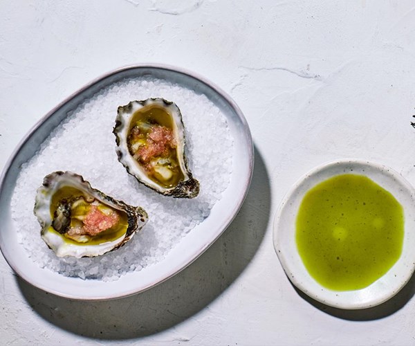 Lemon-aspen vinegar with anise-myrtle oil and finger lime (Oysters à la Raes)
