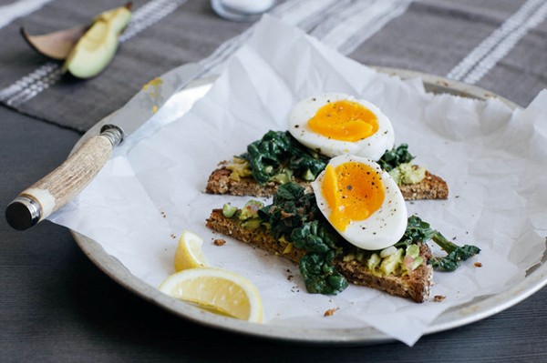 Lemon-braised spinach and egg toasts