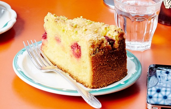 Lemon cake with raspberries and pistachios