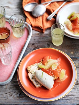 Lemon cheesecake with citrus salad and limoncello syrup