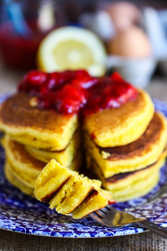 Lemon cornmeal pancakes with strawberry sauce