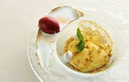 Lemon curd with blackcurrant sorbet, oatmeal and mint glass