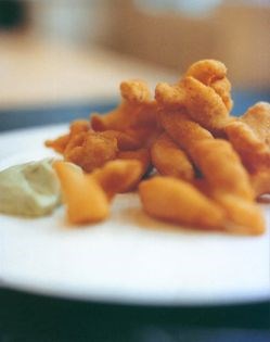 Lemon fish fingers with an avocado and lime dip
