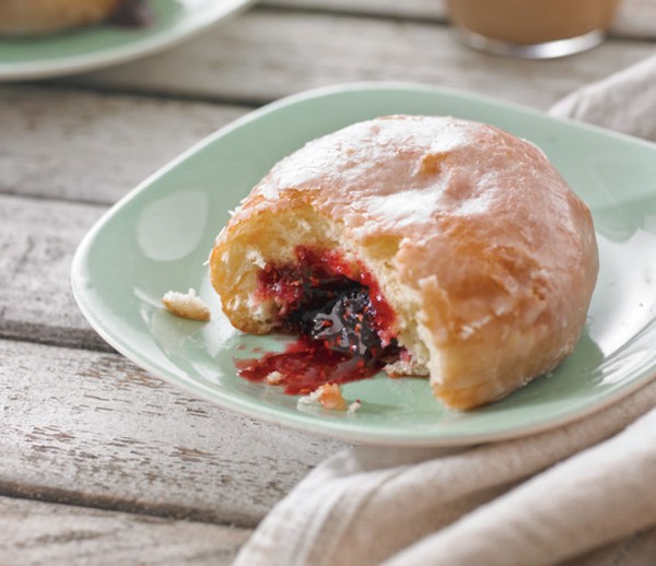 Lemon-glazed raspberry jam doughnuts