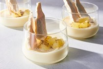 Lemon-labneh possets with meringue and burnt lemon powder