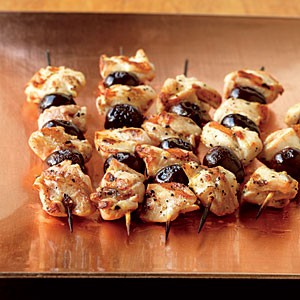 Lemon-marinated chicken and olive skewers