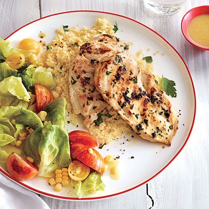 Lemon-parsley chicken with corn and tomato salad