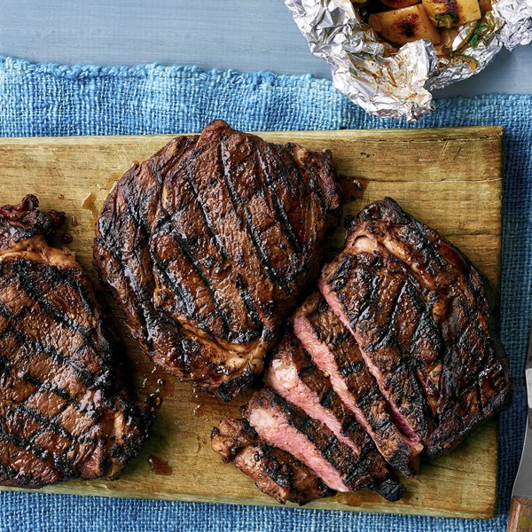 Lemon-pepper grilled rib-eyes
