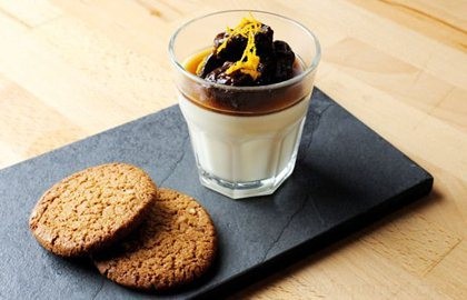 Lemon posset with ginger snap biscuits and Earl Grey soaked prunes with brandy