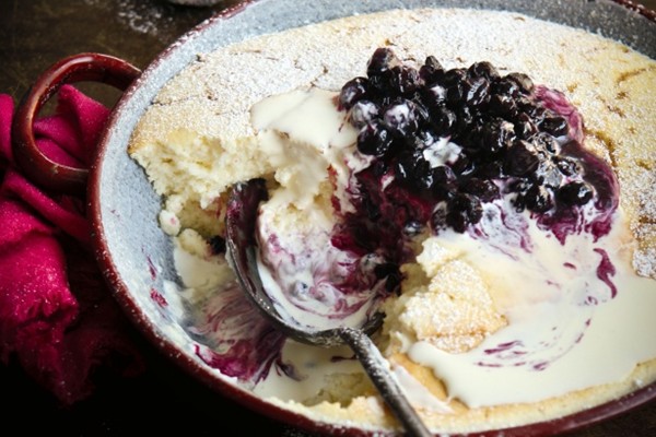 Lemon pudding with blueberry compote