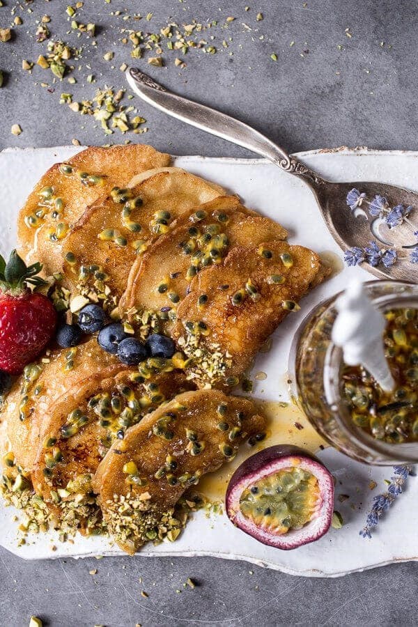 Lemon ricotta stuffed Syrian pistachio pancakes with lavender passionfruit syrup