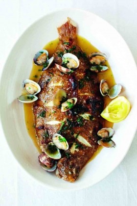 Lemon sole on the bone with parsley and clam butter
