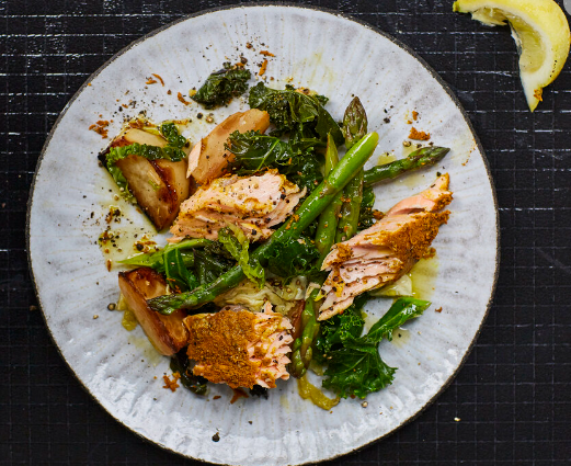 Lemon, turmeric and black-pepper salmon with spring greens