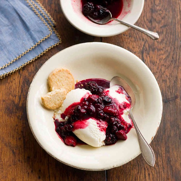 Lemon verbena buttermilk ice cream with berry sauce