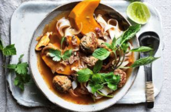 Lemongrass pork meatball soup with noodles, pumpkin and mushrooms
