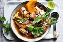 Lemongrass pork meatball soup with noodles, pumpkin and mushrooms