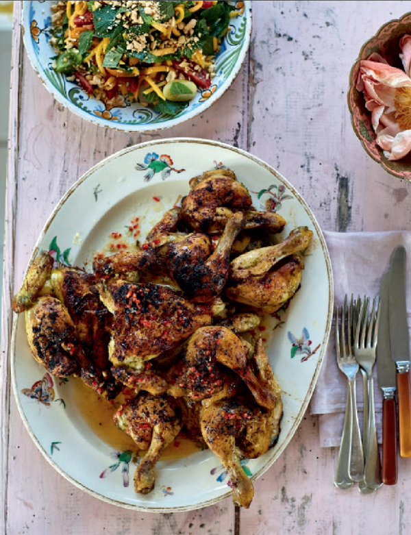 Lemongrass poussin with green mango and peanut salad