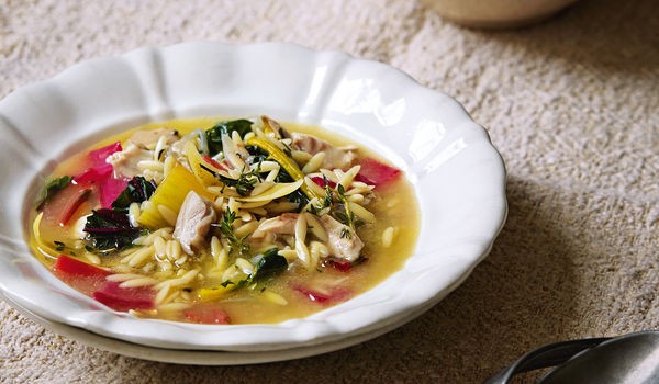 Lemony chicken broth with orzo pasta and chard