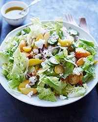 Lemony escarole salad with peaches and feta