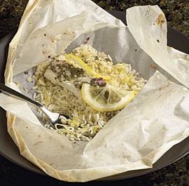 Lemony halibut en papillotes with leek rice pilaf