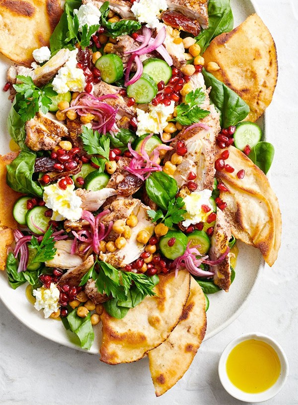 Lemony sumac chicken and chickpea salad with dates, feta and baby spinach