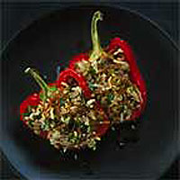 Lentil, caramelised onion and rice-stuffed peppers