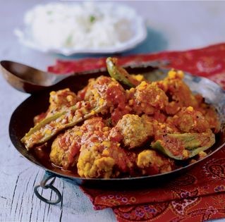 Lentil fritters in tomato sauce