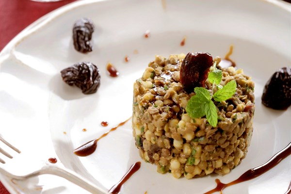 Lentil-pasta terrine with cumin and prunes (Kypriaki mountzentra)