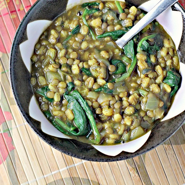  Lentil-pomegranate stew with spinach and raisins