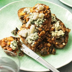 Lentil, silverbeet, tomato and blue cheese bruschetta