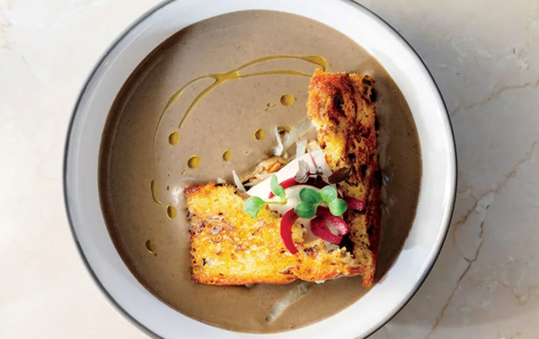 Lentil velouté with cabbage and toasted brioche