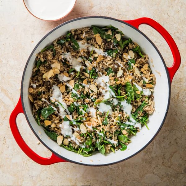 Lentils and rice with yogurt sauce and crunchy toasted almonds