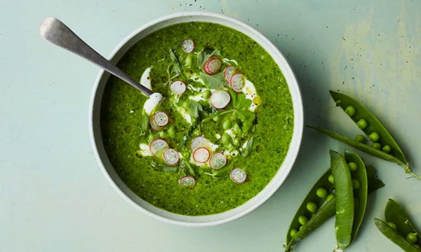 Lettuce soup with peas and soft herbs