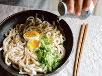 Life-changing udon with soft-boiled egg, hot soy, and black pepper